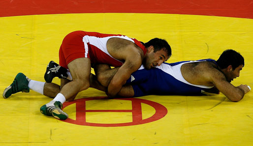 Eine haarige Angelegenheit: Der Deutsche Davyd Bichinashvili (in rot) verpasste im Freistil bis 84 kg die Bronze-Medaille