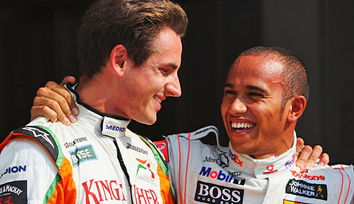 Die Party stieg bei den Spitzenreitern. Lewis Hamilton (r.) und Adrian Sutil sind alte Kumpels