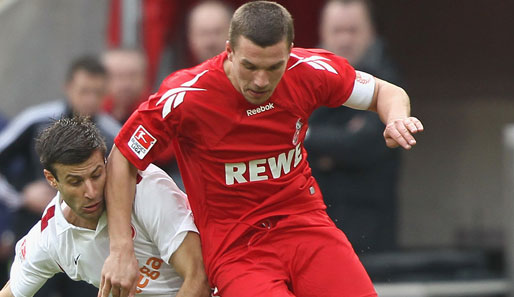 1. FC Köln - Mainz 05 4:2: Lukas Podolski (r.), hier im Zweikampf mit Marco Caligiuri, sorgte mit einem Freistoßtreffer in der 3. Minute für die frühe Führung der Gastgeber