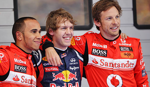Hinter diesem Trio. Vettel inmitten der beiden neuen Roten Button und Hamilton. Ob sich dieser Trend zum neuen Overall wirklich durchsetzt?
