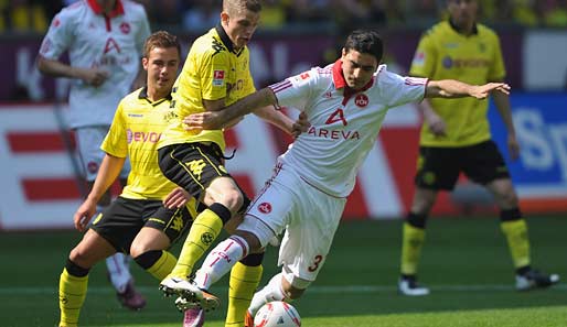 Dortmund und Sven Bender (l.) konnte den Club in Person von Mittelfeldspieler Mehmet Ekici aber bremsen