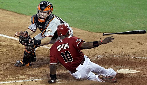 Justin Upton mit dem gewinnbringenden Slide für die Arizona Diamondbacks im MLB-Spiel gegen die San Francisco Giants