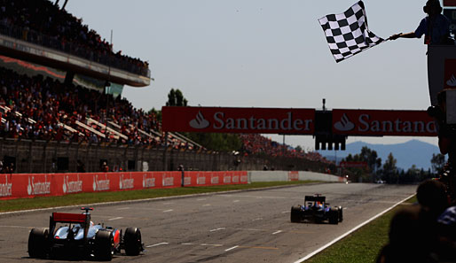 In den letzten 15 Runden des Rennens kam Lewis Hamilton immer näher, aber Sebastian Vettel rettete seine Führung ins Ziel