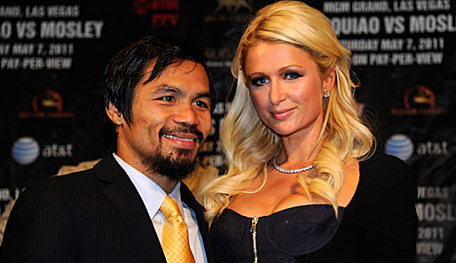 Nach seinem glatten Punktsieg gegen Shane Mosley hat Box-Weltmeister Manny Pacquiao allen Grund zur Freude. Und neben Paris Hilton lässt sich's eh aushalten