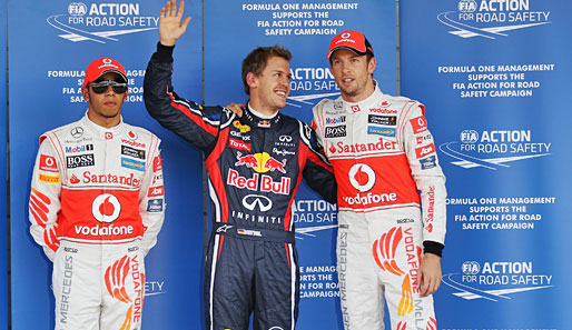 Das Siegerfoto mit Vettel, Button und Hamilton nach dem Qualifying. Raten Sie mal, wer von den dreien am wenigsten zufrieden war...