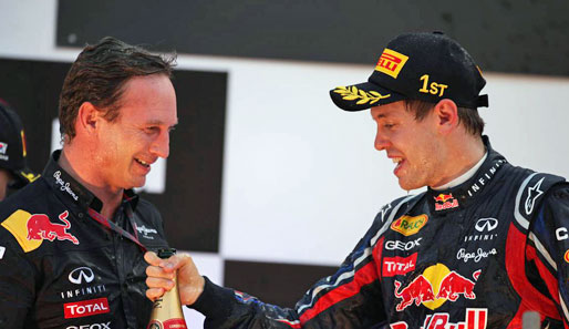 "Na, willste auch nen' Schluck?" Vettel und Teamchef Christian Horner feiern den zweiten Konstrukteurs-Titel für Red Bull