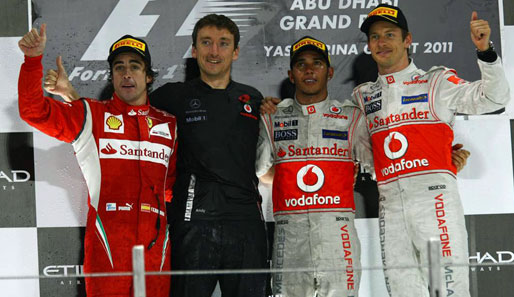 Fernando Alonso und Jenson Button komplettierten das Podest. Ungewohnt ohne Vettel