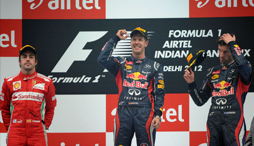 Die ersten drei Plätze in der Übersicht: 1. Sebastian Vettel (M.), 2. Fernando Alonso (l.), 3. Mark Webber