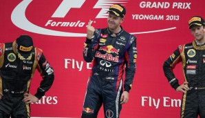 Auf dem Podest folgte der Vettel-Finger. Kimi Räikkönen (l.) und Romain Grosjean zeigten das zufriedenste Gesicht, das ihnen zur Verfügung stand