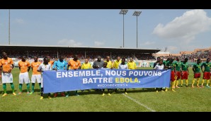 Vor dem Qualifikationsspiel für den Afrika Cup 2015 demonstrierten beide Teams gemeinsamen Willen im Kampf gegen Ebola