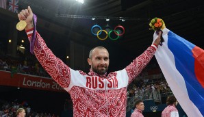 Die Flagge der umstrittensten Sportnation der diesjährigen Spiele trägt der Volleyballer Sergey Tetyukhin