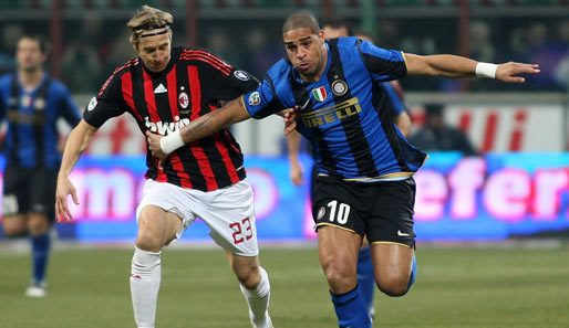 2005 und 2006 gewann er mit Inter den Meistertitel. Hier setzt er sich im Derby gegen Milans Ambrosini durch