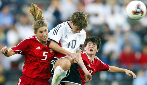Der ersehnte WM-Titel 2003: Bei der WM in den USA siegte die deutsche Mannschaft zum Auftakt gegen Kanada mit 4:1