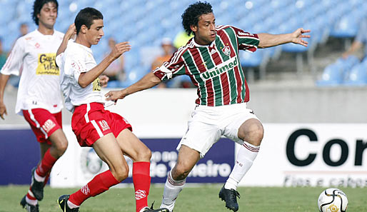 Fred (r.) erzielte für Olympique Lyon in vier Jahren 34 Tore. Seit 2009 spielt er in Rio bei Fluminense