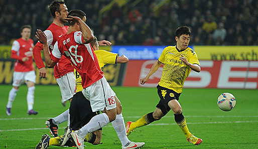 Shinji Kagawa (r.) sorgte 180 Sekunden nach dem Mainzer Ausgleich für den 2:1-Siegtreffer der Borussia