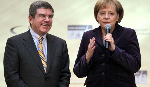Angela Merkel und Thomas Bach untertützen die Eishockey-WM 2010