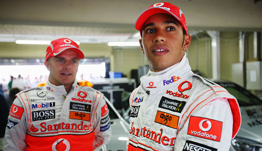 Heikki Kovalainen (l.) sagt Weltmeister Lewis Hamilton den Kampf an