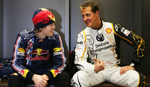Sebastian Vettel (l.) und Michael Schumacher sind in der kommenden Saison Konkurrenten