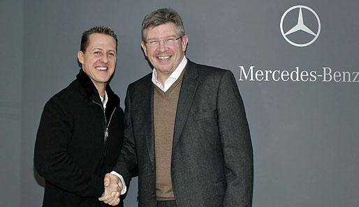 Ross Brawn (r.) glaubt an eine erfolgreiche Zusammenarbeit mit Michael Schumacher