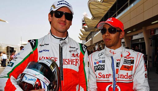 Adrian Sutil (l.) fährt seit 2008 für das Force-India-Team