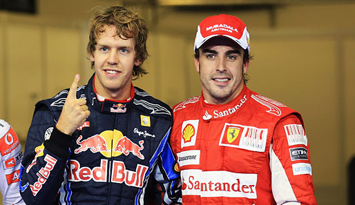 Fernando Alonso (r.) will Sebastian Vettel unter Druck setzen