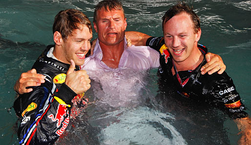Sebastian Vettel und David Coulthard nach Vettels Sieg in Monaco im Swimming-Pool