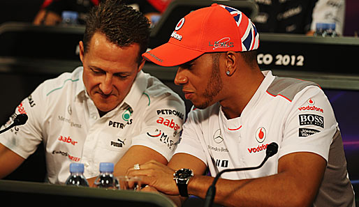 Der Rekordchampion Michael Schumacher (l.) neben seinem angeblichen Nachfolger Lewis Hamilton