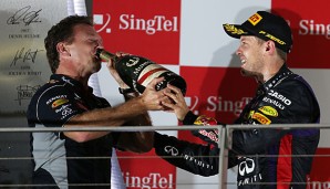 Christian Horner und Sebastian Vettel feiern im Team Red Bull Erfolg über Erfolg