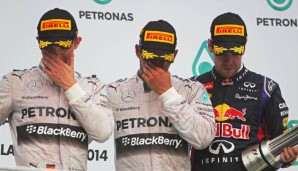 Nur eine Momentaufnahme: Auf dem Podium herrschte bei Rosberg, Hamilton und Vettel Freude