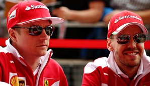 Ferrari-Fans dürfen sich auch im kommenden Jahr auf das Fahrerduo Kimi Raikkönen (r.) Sebastian Vettel freuen