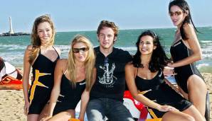 ... mal ließen sie sich mit Fahrern wie Jenson Button am Strand ablichten.
