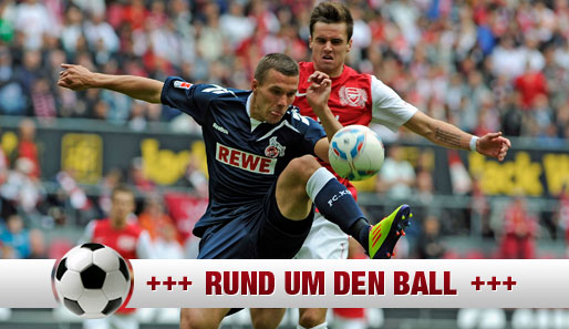 Wie es ausschaut, ist Lukas Podolski (l.) seine Kapitänsbinde beim 1. FC Köln los