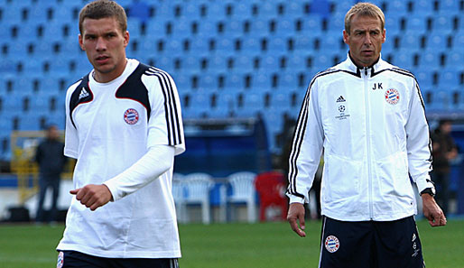 Gehen sie schon bald getrennte Wege? Jürgen Klinsmann (r.) setzt Podolski meist auf die Bank
