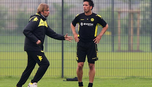 Jürgen Klopp (l.) startet mit Borussia Dortmund in seine vierte Saison als Trainer