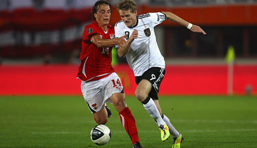 Julian Baumgartlinger (l.) spielte gegen die deutsche Nationalmannschaft in der EM-Quali