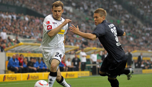 Tony Jantschke (l.) hat seinen Vertrag bei Borussia Mönchengladbach bis 2014 verlängert