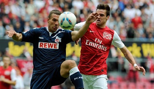 Spielt Lukas Podolski (l.) bereits im Sommer für Arsenal?
