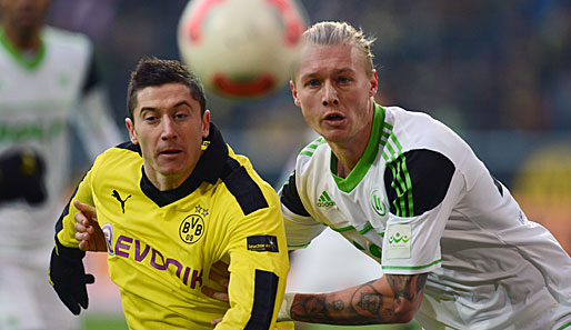 Robert Lewandowski (l.) soll auch weiterhin für die Borussia auf Torejagd gehen