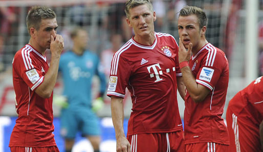 Liegen mit dem FC Bayern auf Kurs: Philipp Lahm, Bastian Schweinsteiger und Mario Götze (v.l.)