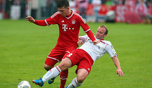 Pierre-Emile Hojberg (l.) hat bei den Bayern einen Profivertrag bis 2016 unterzeichnet