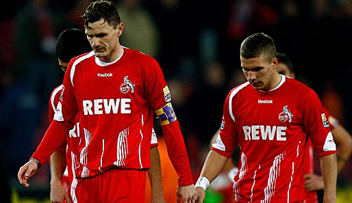Milivoje Novakovic (l.) und Lukas Podolski waren nach der Pleite gegen Hannover bedient