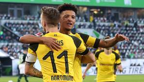 Reus und Sancho bejubeln Dortmunds Sieg in Wolfsburg.