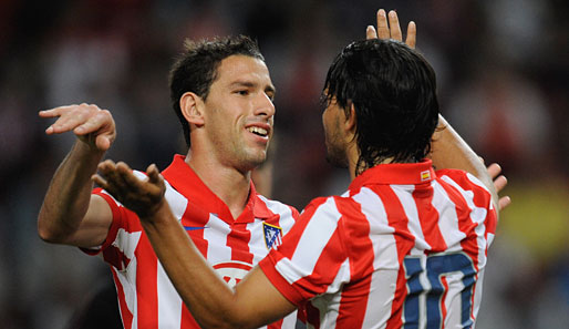 Maxi Rodriguez (l.) und Sergio Agüero trafen für Atletico in Athen