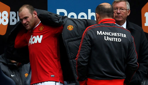Wayne Rooney (l.) musste am Wochenende gegen die Bolton Wanderers verletzt vom Platz