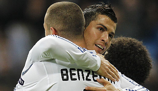 Karim Benzema (l.) erzielte das 1:0 für Real Madrid bei seinem Ex-Klub Olympique Lyon