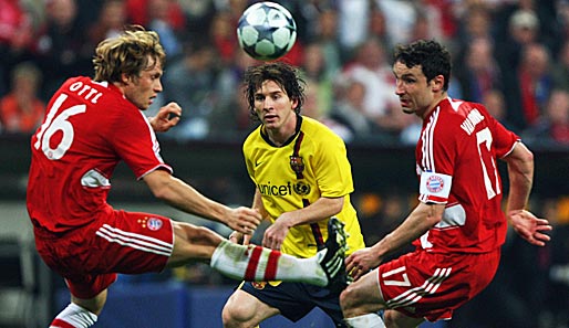 Mark van Bommel (r.) spielte vier Jahre für den FC Bayern und ein Jahr für den FC Barcelona