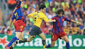 Cesc Fabregas (M.) verlor 2006 das Finale mit Arsenal gegen seine alte Liebe Barcelona. Dann ging er zu Barca, doch just in seiner Zeit holte die Blaugrana keinen Pott. Dumm gelaufen...