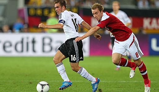 Philipp Lahm (l.) lieferte gegen Dänemark eine starke Vorstellung ab