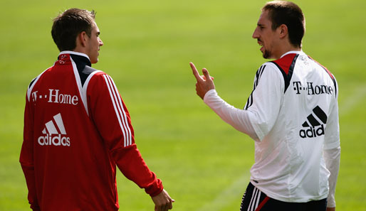 Philipp Lahm (l.) und Franck Ribery stehen auch in der UEFA-Topelf
