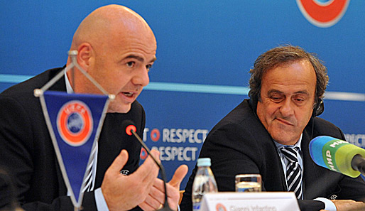 UEFA-Generalsekretär Gianni Infantino (l.) und Boss Michel Platini (r.) warnen die Klubs